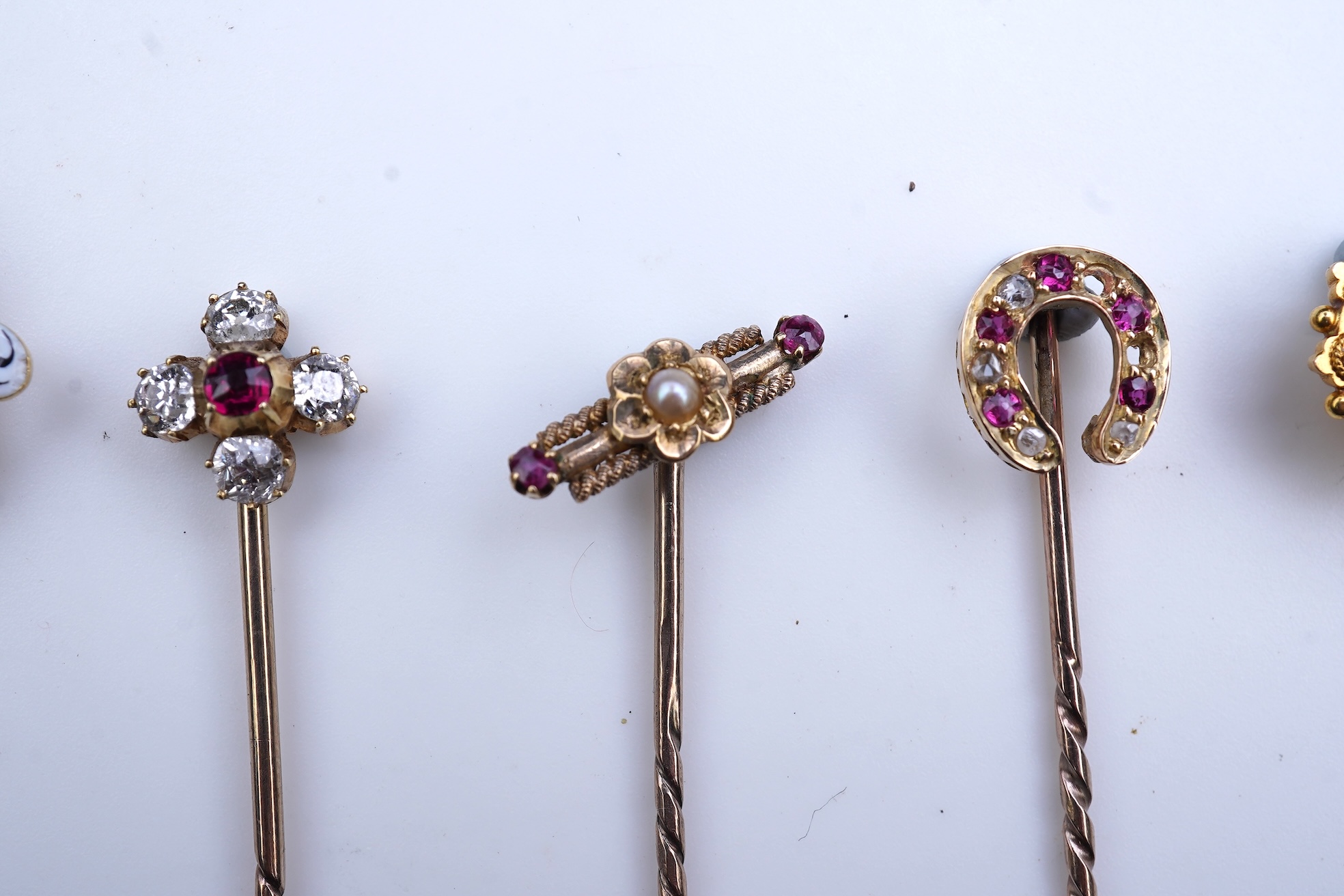 A collection of eight tie pins, 19th and 20th century